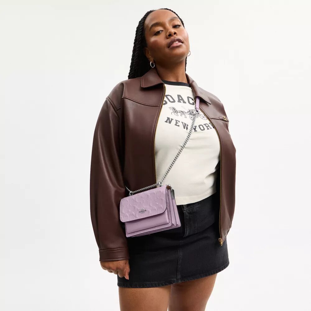 Mini Klare-crossbody-veske i signaturlær