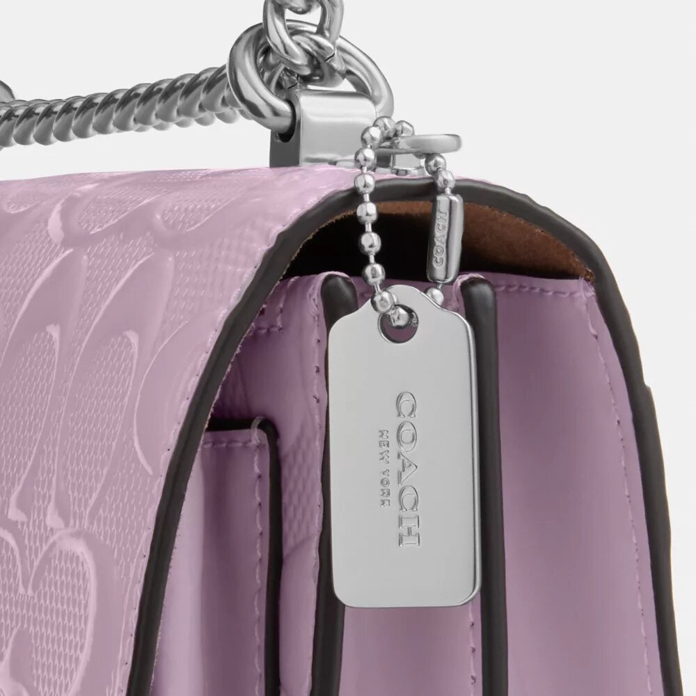 Mini Klare-crossbody-veske i signaturlær
