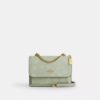 Mini Klare-crossbody-veske med blomstermønster