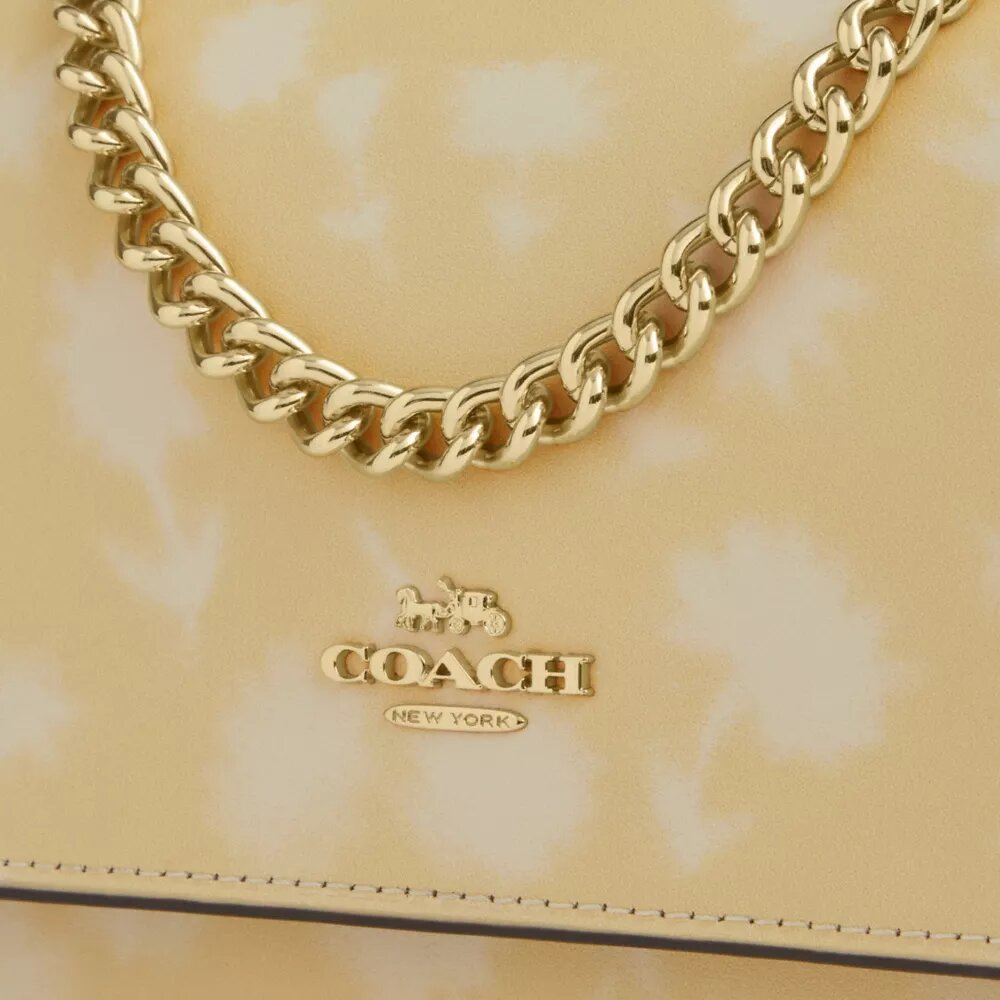 Mini Klare-crossbody-veske med blomstermønster