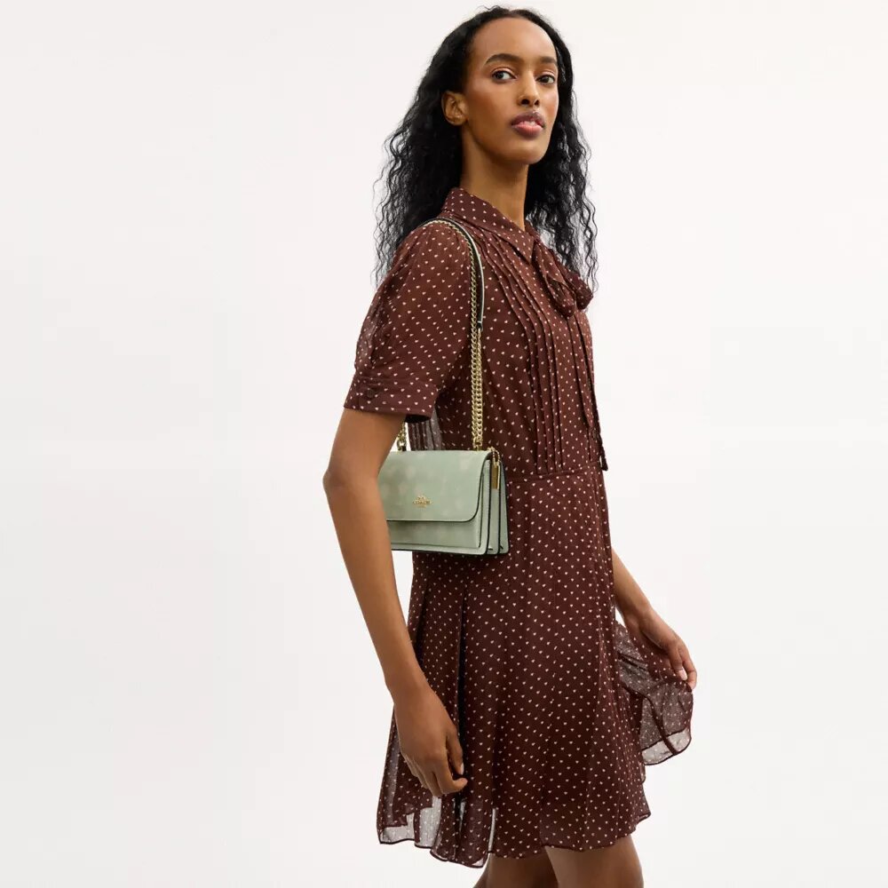Mini Klare-crossbody-veske med blomstermønster