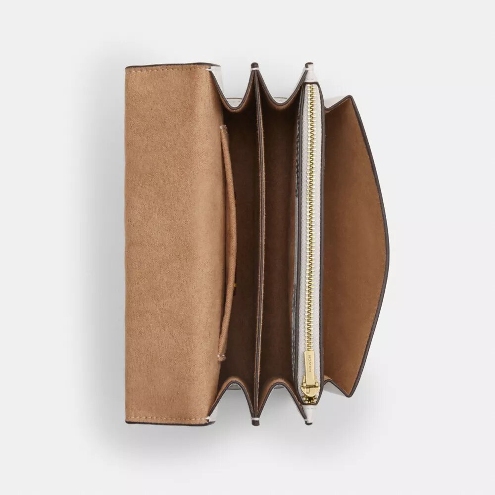 Mini Klare-crossbody-veske med kryssrem og godterimønster