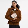 Mini Klare-crossbody-veske med kryssrem og godterimønster