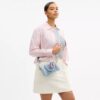 Mini Rowan-crossbody-veske i «Loved Denim» med anheng