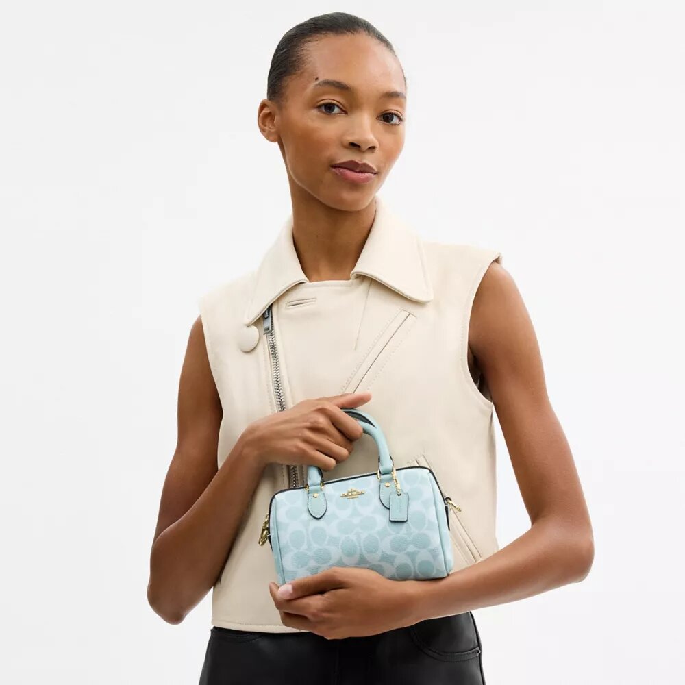 Mini Rowan-crossbody-veske i Signature Canvas