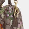 Mini Rowan-crossbody-veske med kryssrem i signaturjacquard med blomsterbroderi