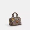 Mini Rowan-crossbody-veske med kryssrem i signaturjacquard med blomsterbroderi