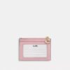 Mini Skinny ID-etui i «Loved Denim» med vattering og anheng