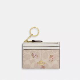 Mini Skinny ID-etui i Signature Canvas med blomstermønster