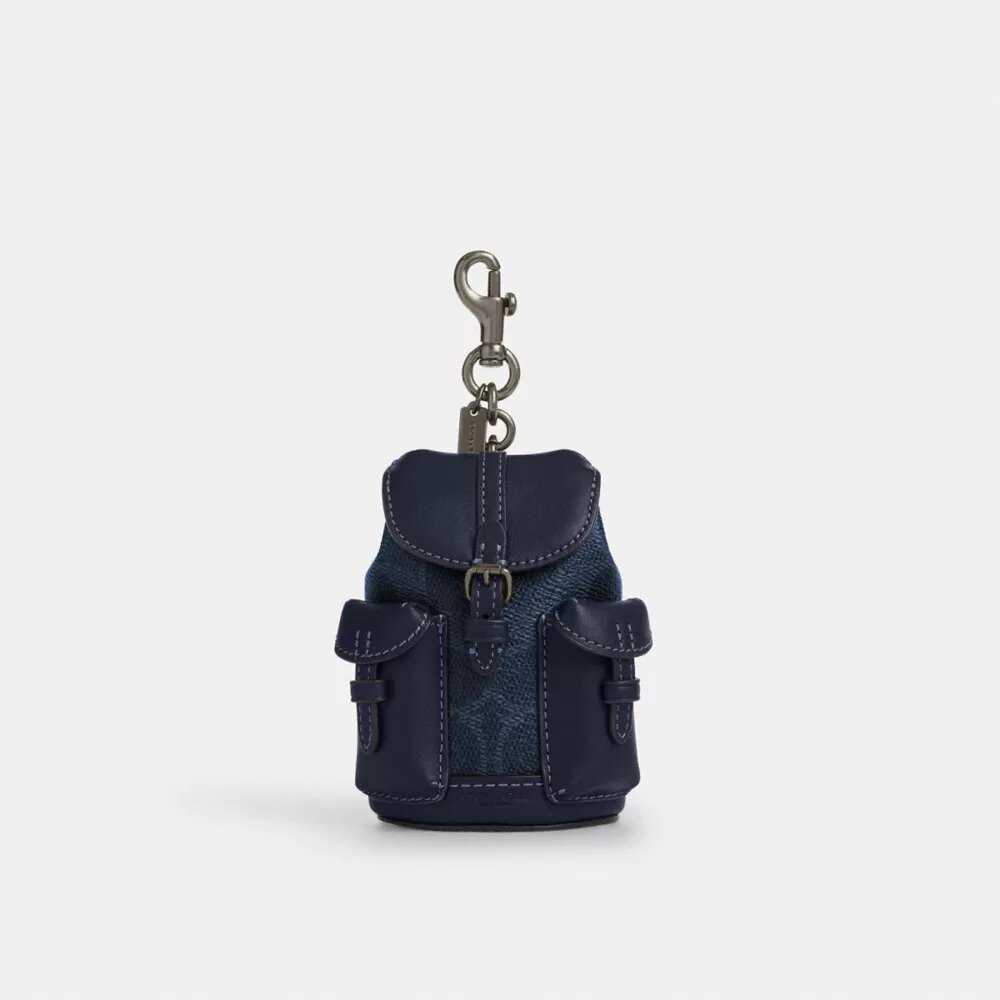Mini Warner-ryggsekk-veskeanheng i Signature Canvas
