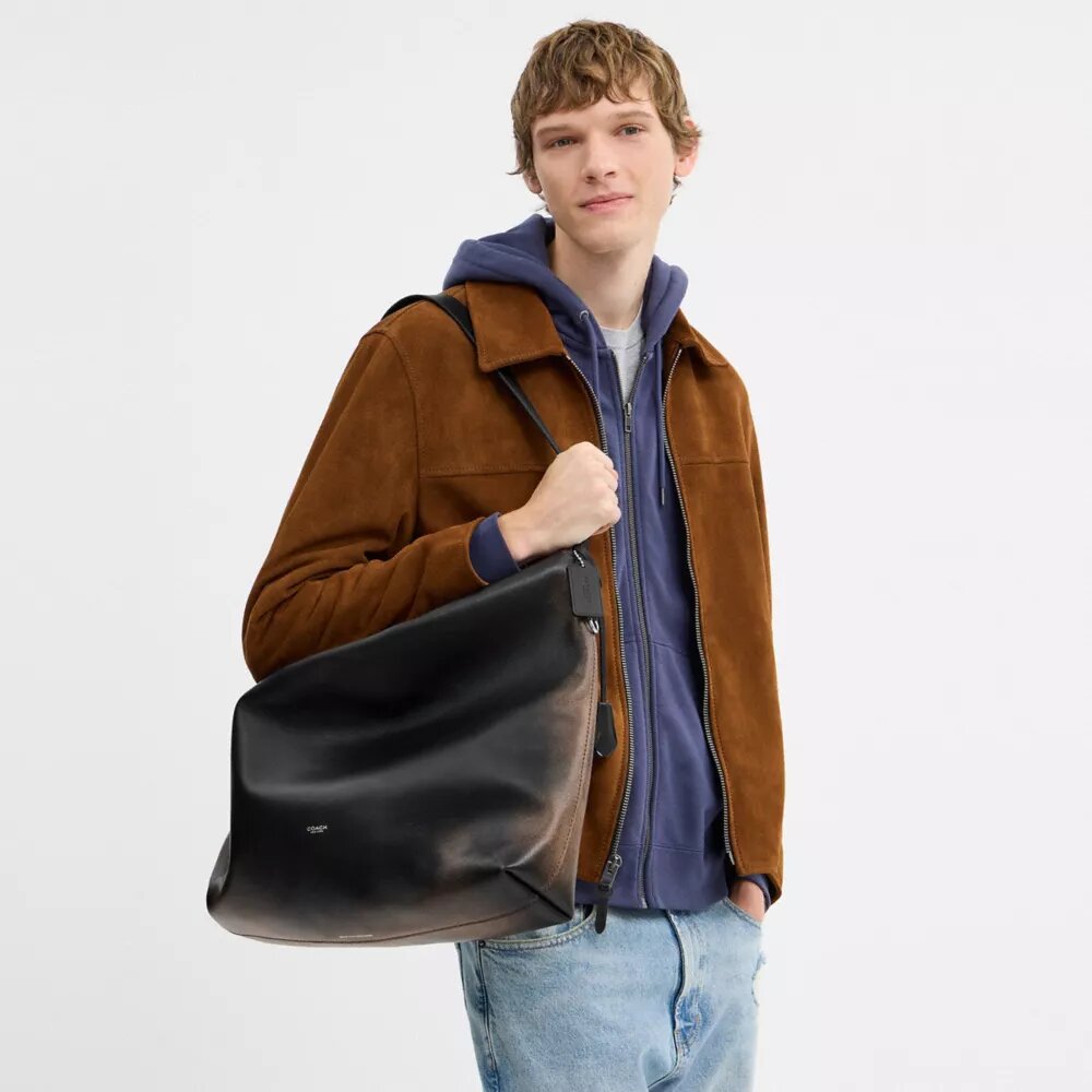 Mott-messengerveske i «Loved Leather»