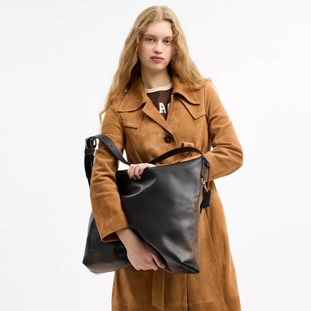 Mott-messengerveske i «Loved Leather»