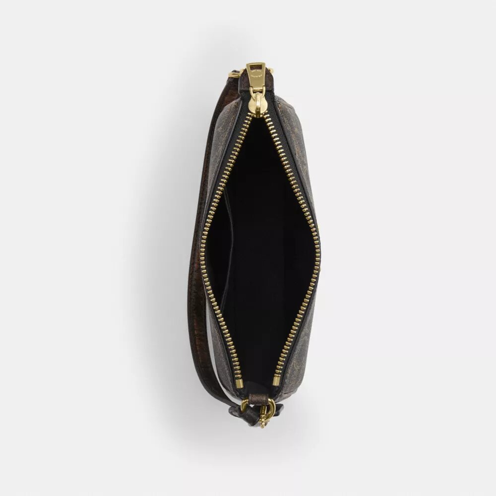 Nolita 19 i «Loved Signature Canvas»-kanvas med anheng