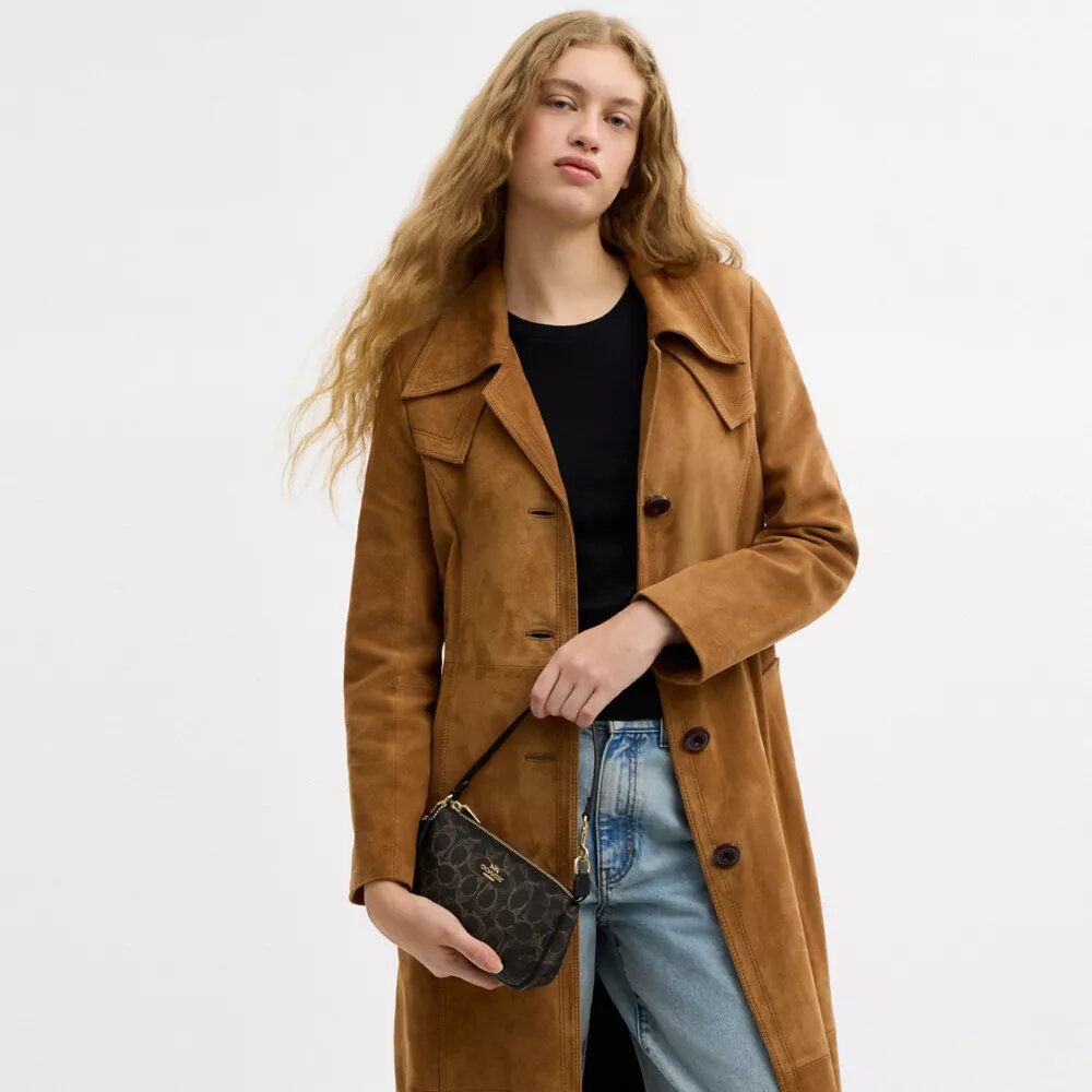 Nolita 19 i «Loved Signature Canvas»-kanvas med anheng