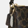 Nolita 19 i «Loved Signature Canvas»-kanvas med anheng