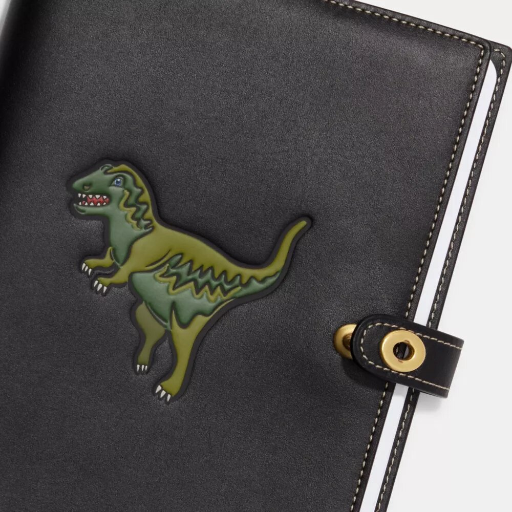 Notatbok med Rexy
