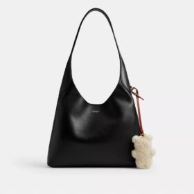Puffet bjørneveskeanheng i shearling