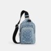 Racer Sling Pack i «Loved» Signature-denim