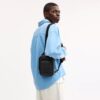 Racer Sling Pack i Signature Canvas