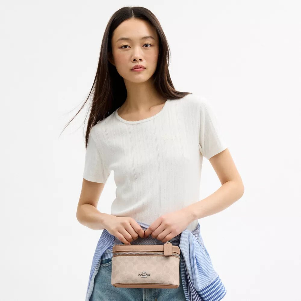 Rainer Crossbody Bag 18 i Signature Canvas
