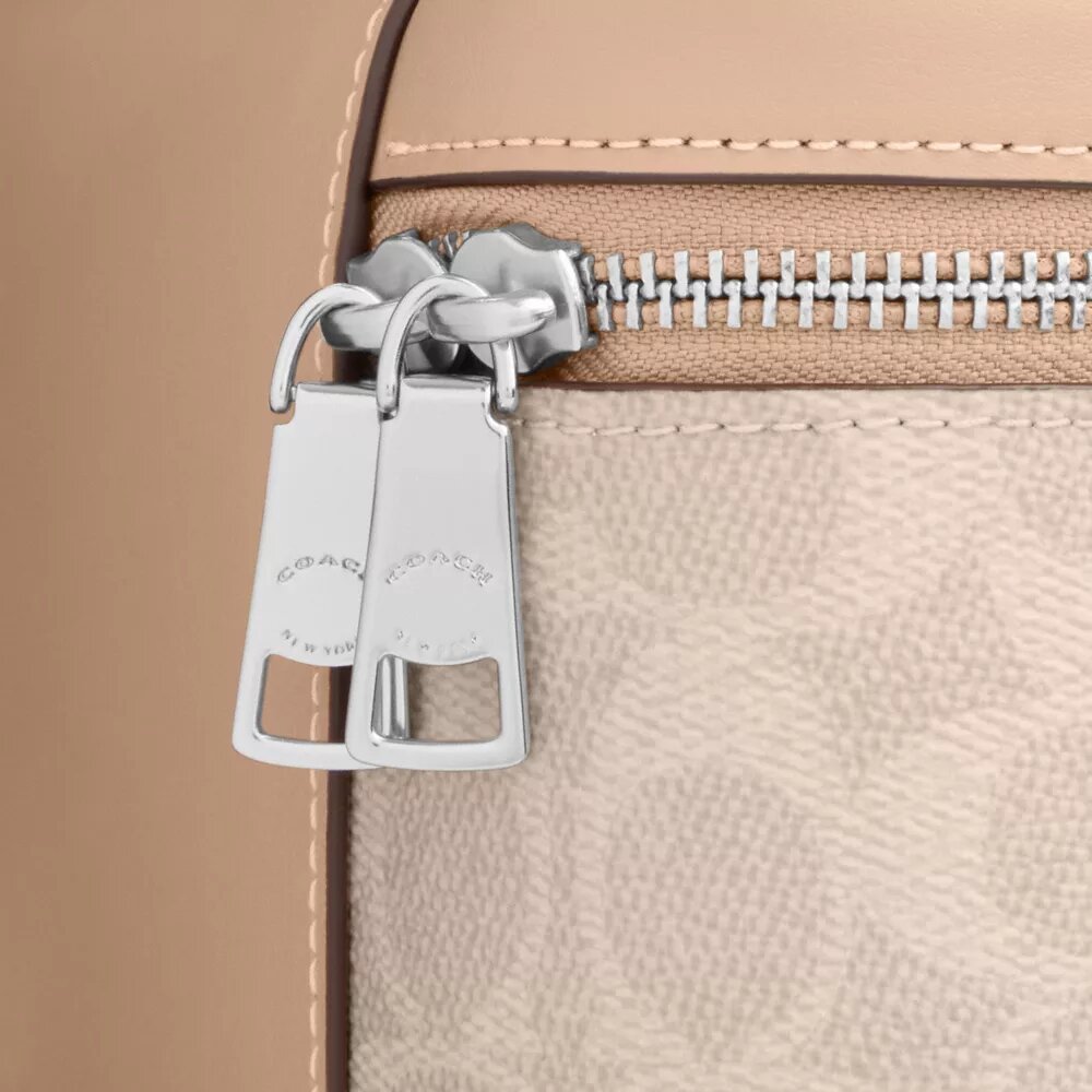 Rainer Crossbody Bag 18 i Signature Canvas