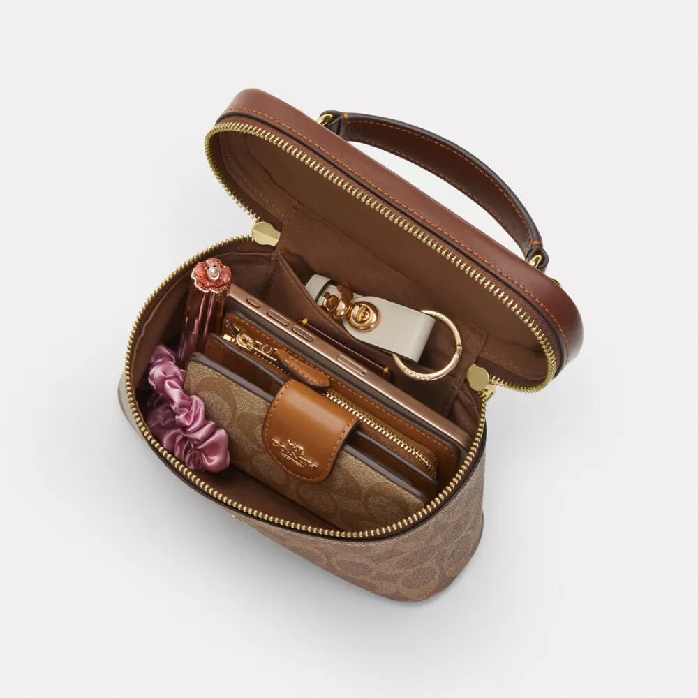 Rainer Crossbody Bag 18 i Signature Canvas