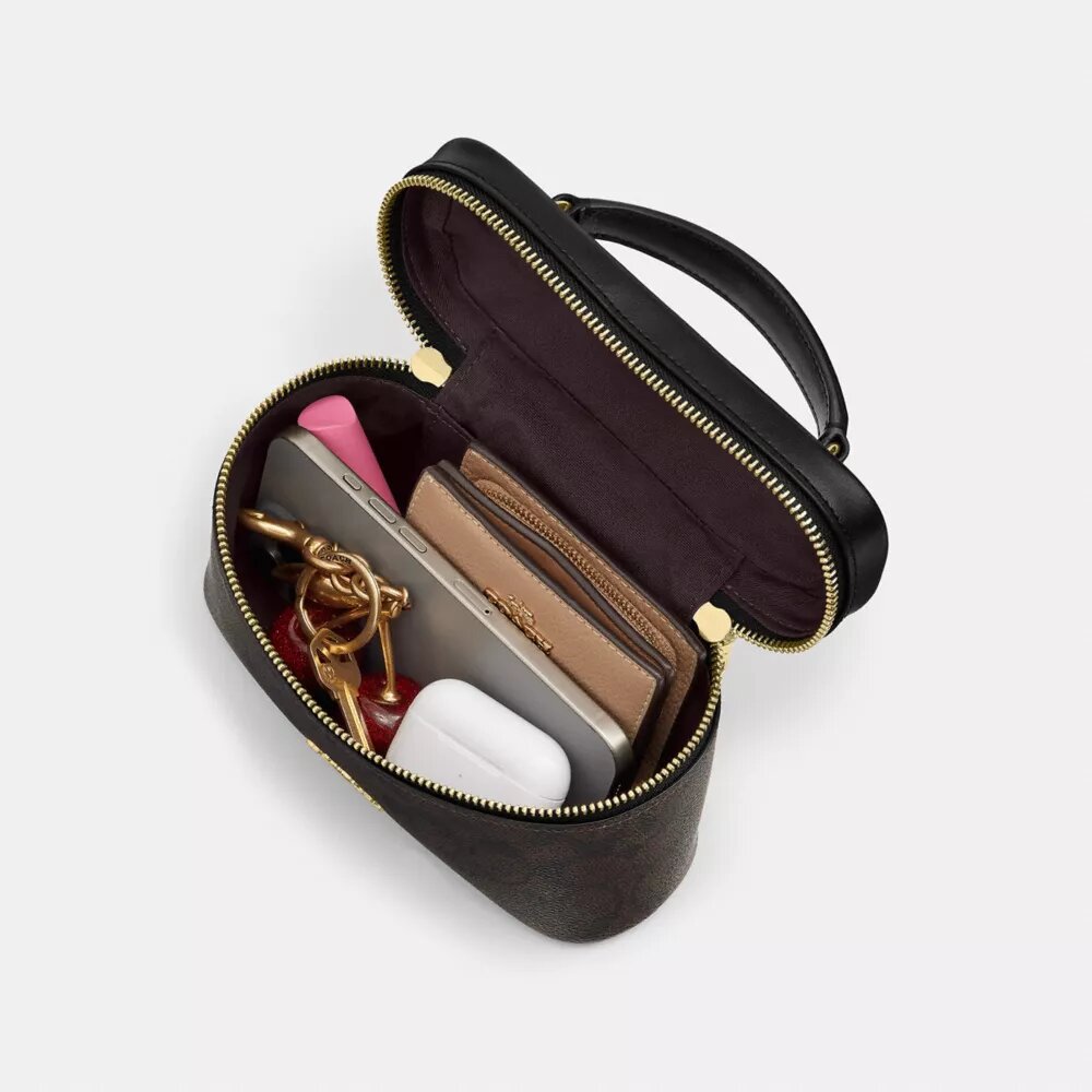 Rainer Crossbody Bag 18 i Signature Canvas