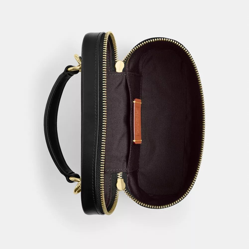 Rainer Crossbody Bag 18 i Signature Canvas