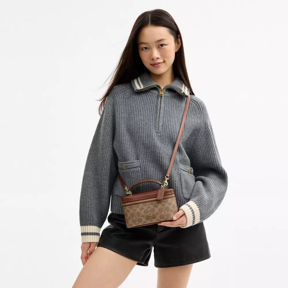 Rainer Crossbody Bag 18 i Signature Canvas