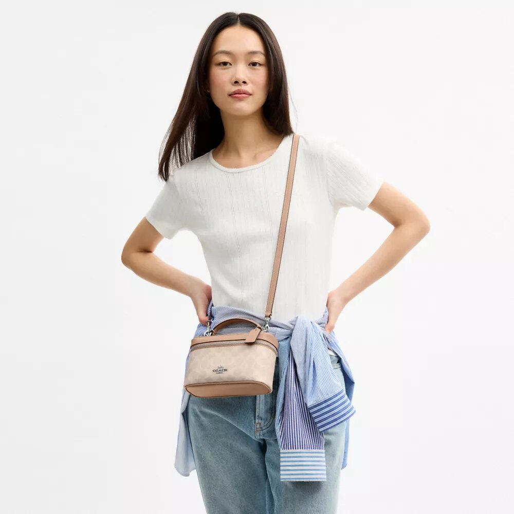 Rainer Crossbody Bag 18 i Signature Canvas