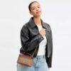 Rainer Crossbody Bag 18 i Signature Canvas
