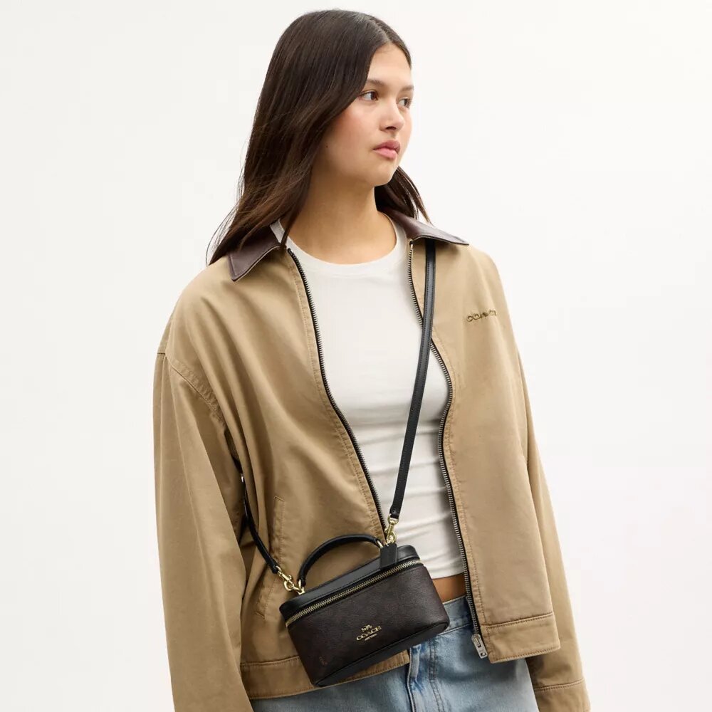 Rainer Crossbody Bag 18 i Signature Canvas