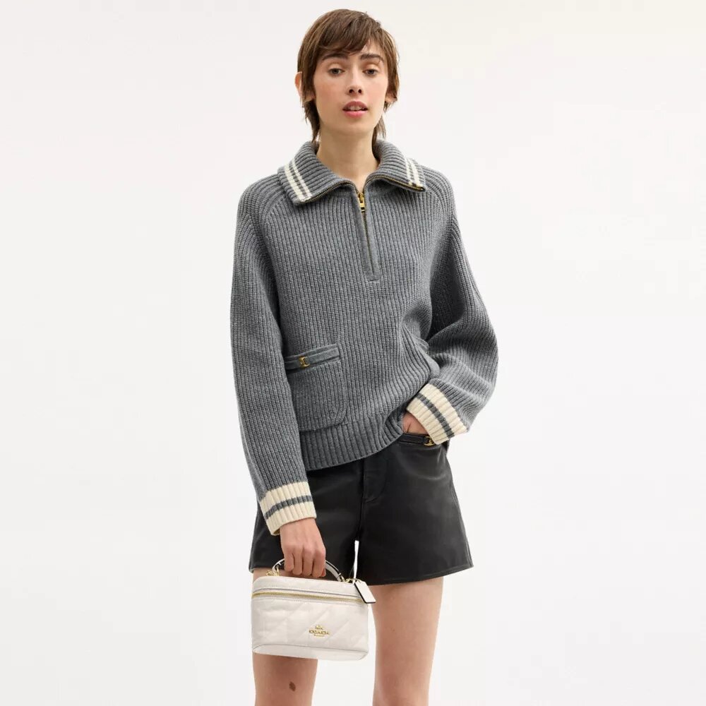 Rainer Crossbody-veske 18 med vattert mønster