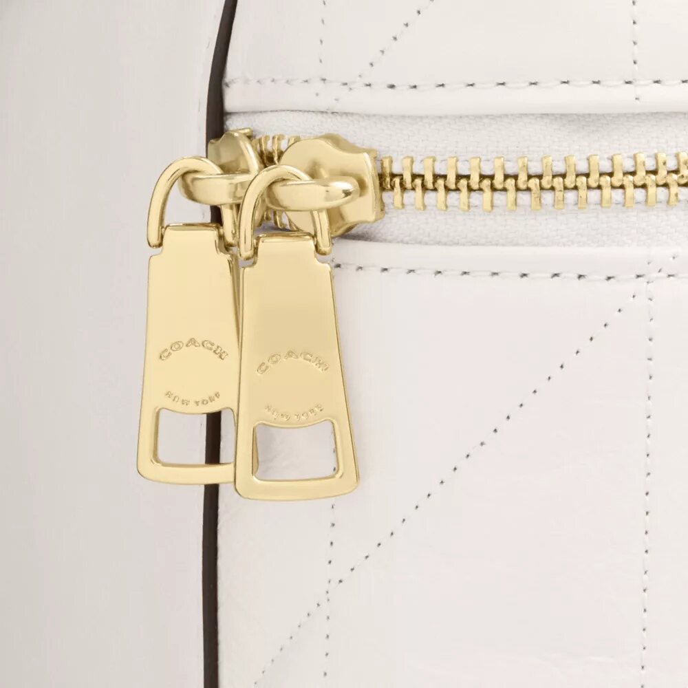 Rainer Crossbody-veske 18 med vattert mønster