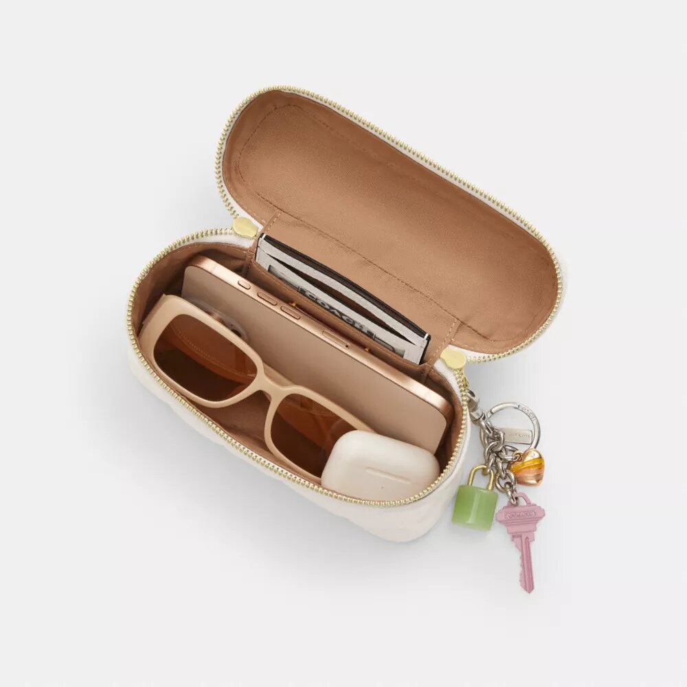 Rainer Crossbody-veske 18 med vattert mønster
