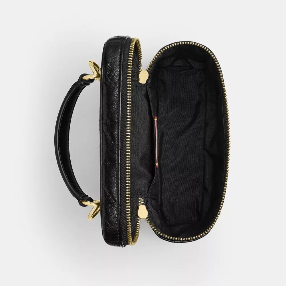 Rainer Crossbody-veske 18 med vattert mønster