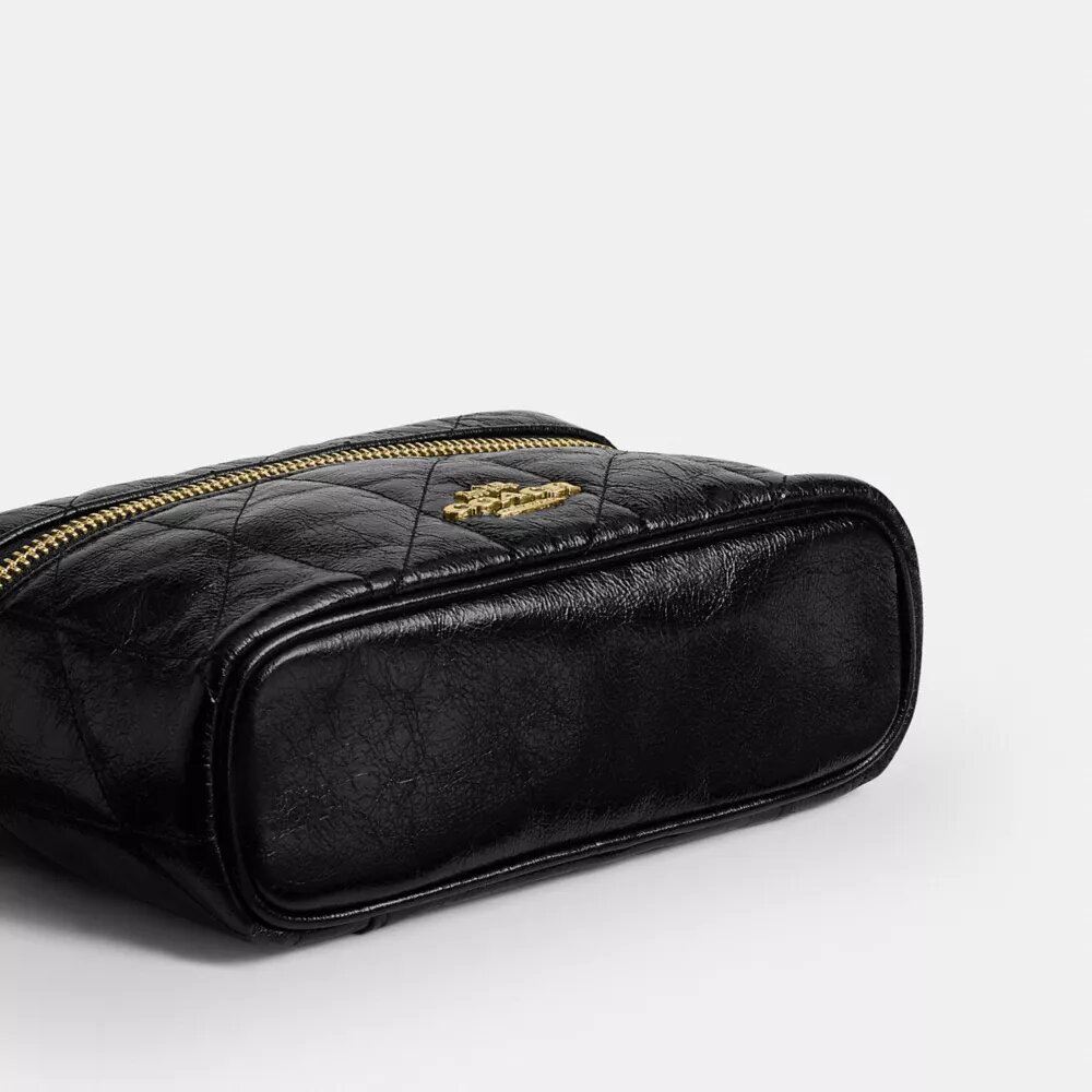 Rainer Crossbody-veske 18 med vattert mønster