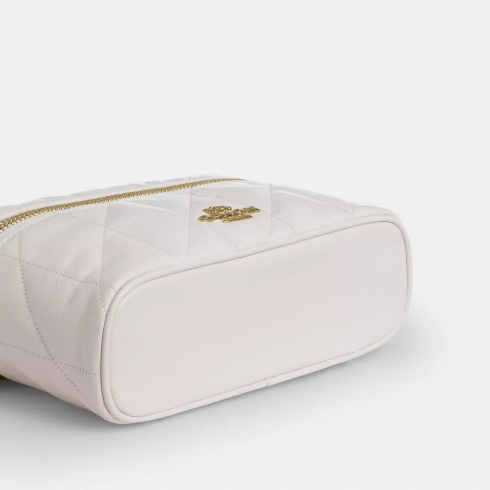 Rainer Crossbody-veske 18 med vattert mønster