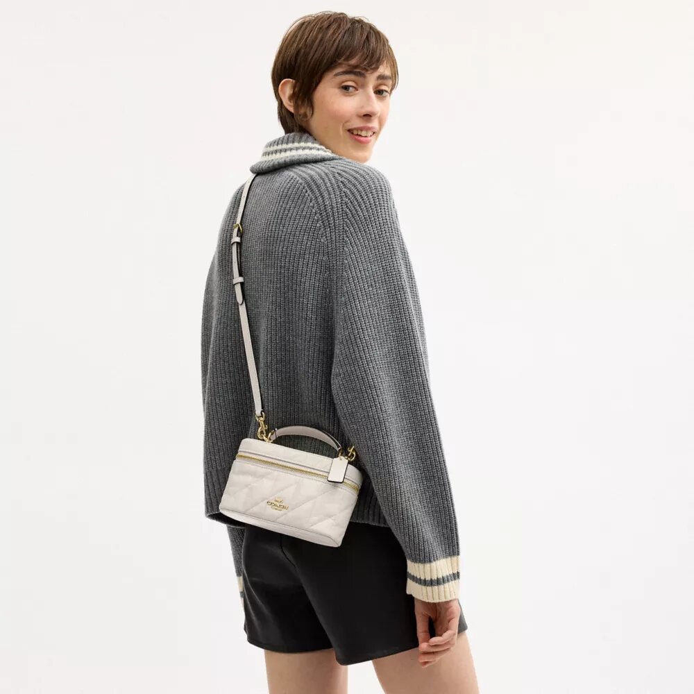 Rainer Crossbody-veske 18 med vattert mønster
