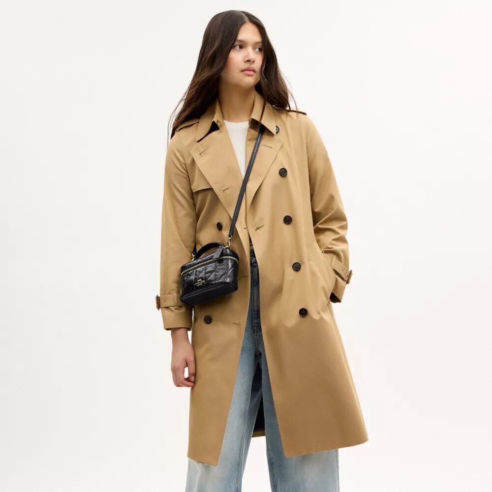 Rainer Crossbody-veske 18 med vattert mønster