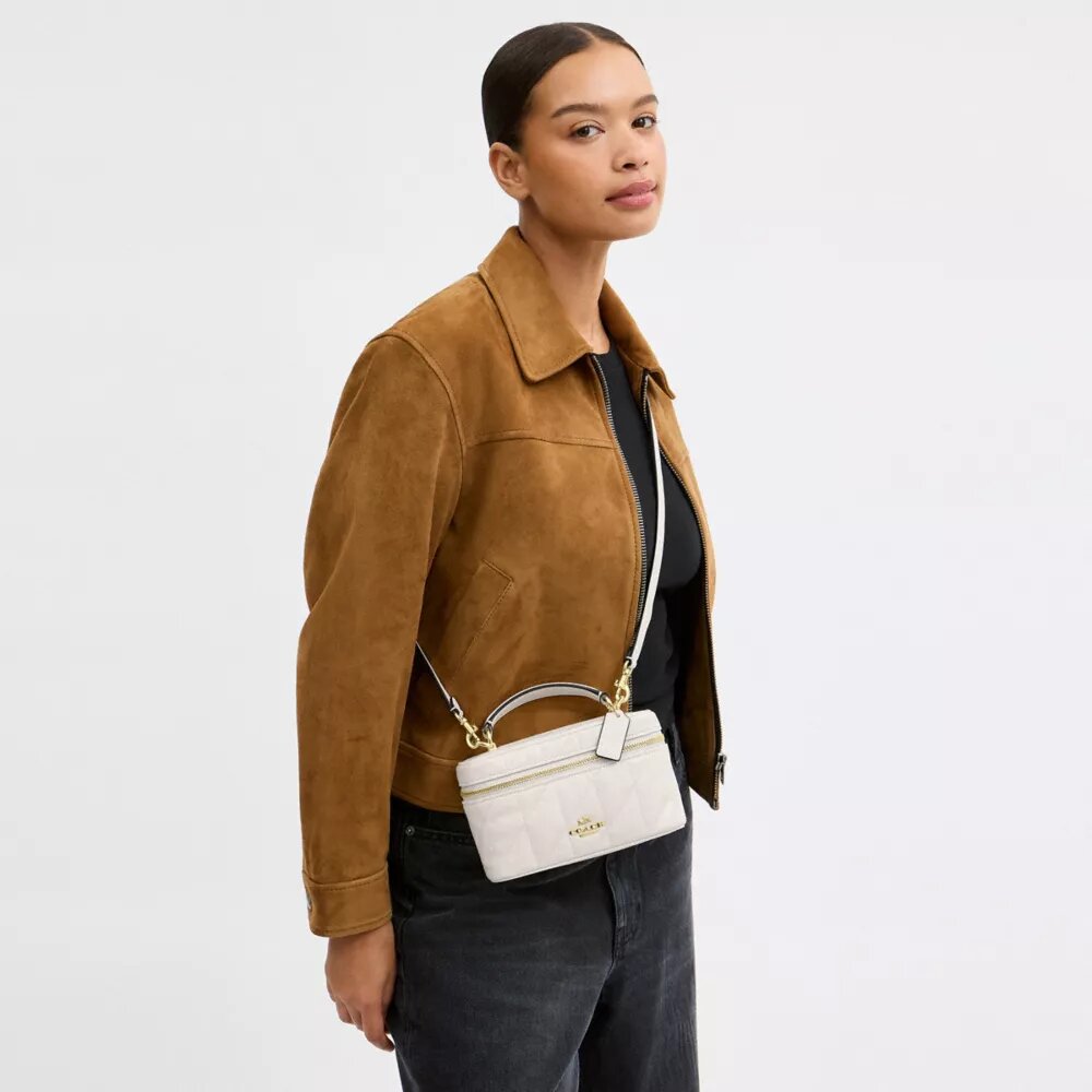Rainer Crossbody-veske 18 med vattert mønster