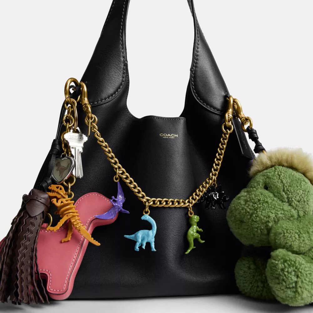 Rexy 10-årsdag Brooklyn skulderveske 28 med anheng