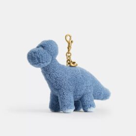 Rexy 10-årsdag Buddy-dinosaur-veskeanheng i shearling