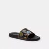 Rexy 10-årsdag Slides-sandaler med klistremerketrykk