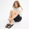 Rexy 10-årsdag Slides-sandaler med klistremerketrykk