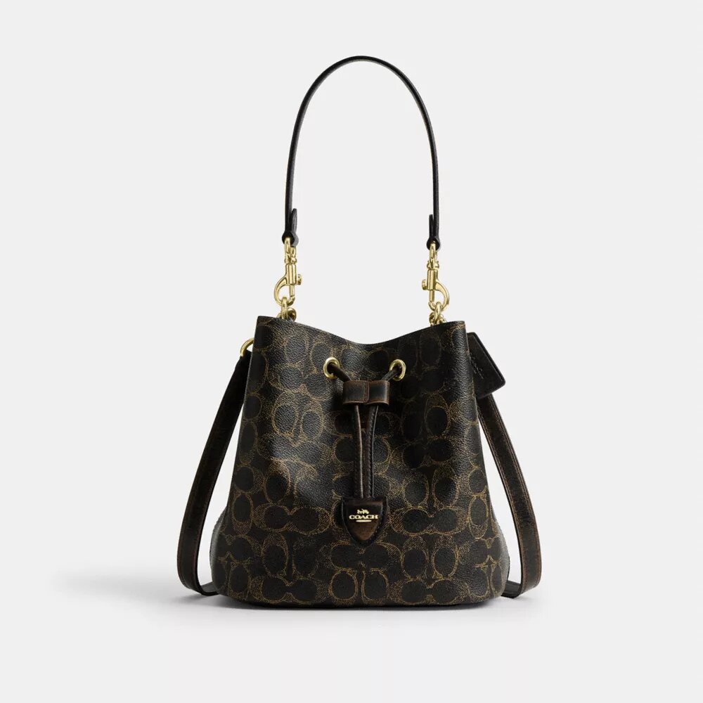 Rowan-bucketbag i «Loved Signature Canvas»-kanvas med anheng