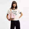 Rowan-bucketbag i Signature Canvas med anheng