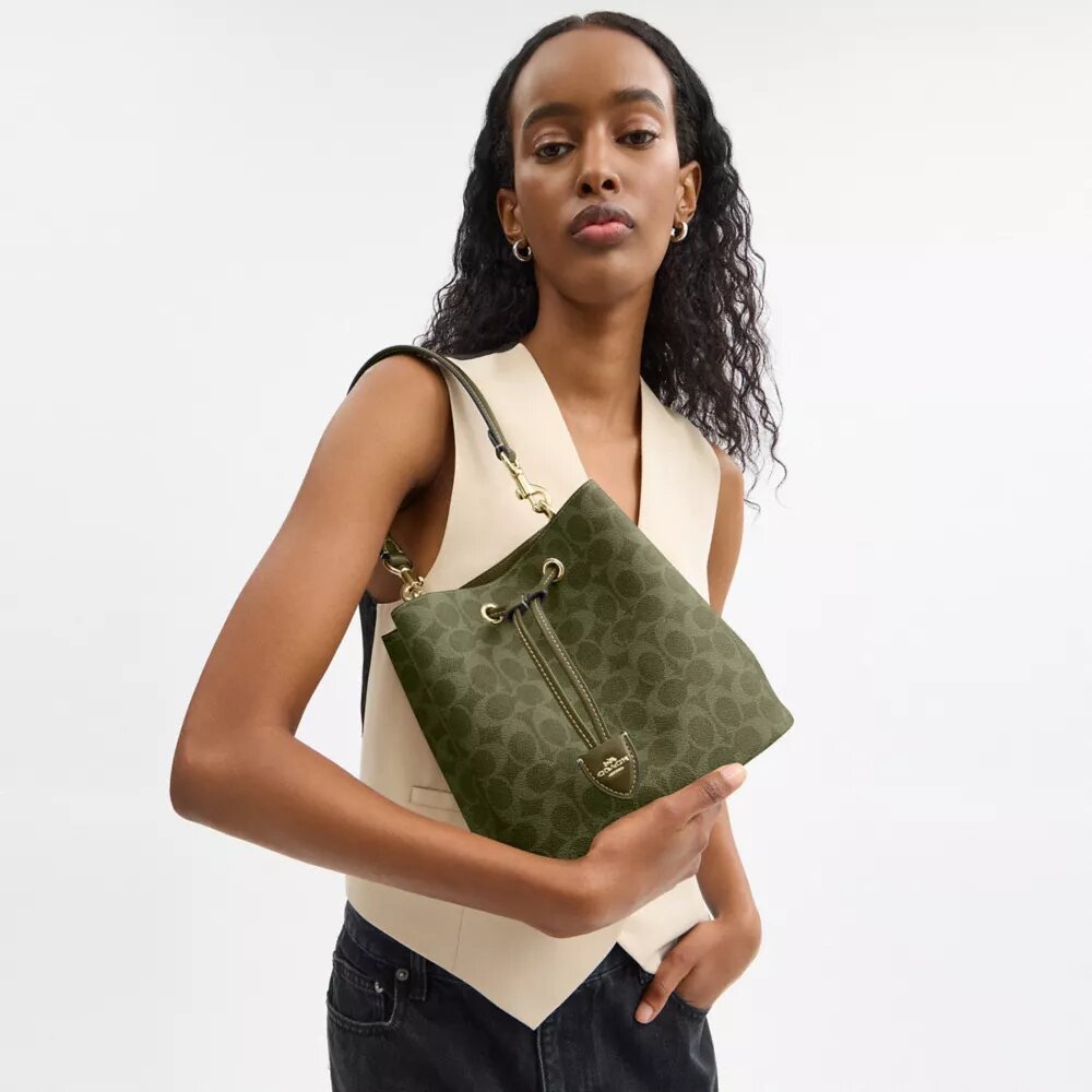 Rowan-bucketveske i Signature Canvas