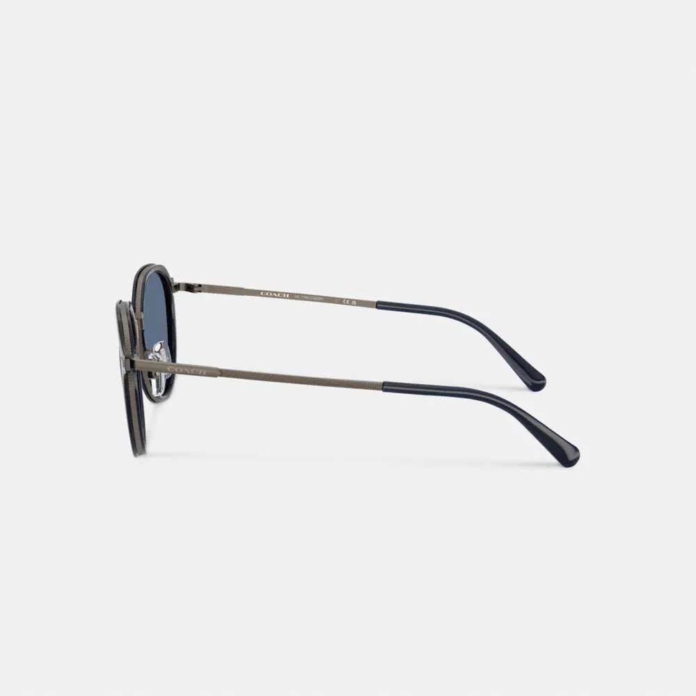 Rund solbrille i strukturert metall