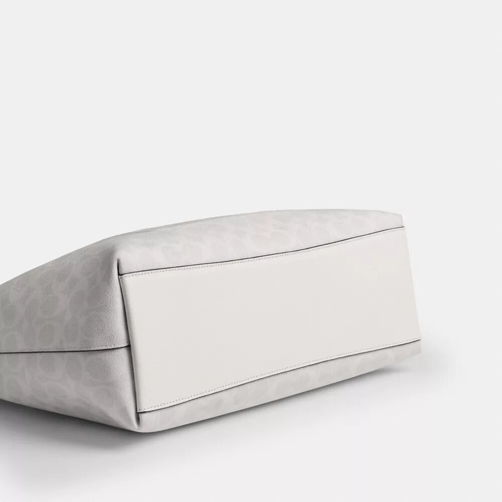 Station-veske i Signature Canvas
